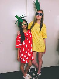 two girls dressed up as pineapples for an instagram contest on instagram