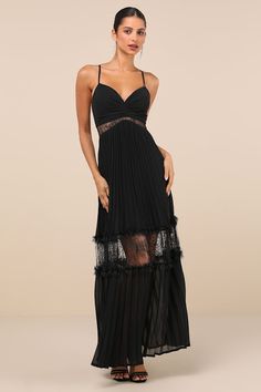 Everyone will be in awe of your aesthetic when you stroll in wearing the Lulus Deeply Stunning Black Lace Pleated Lace-Up Backless Maxi Dress! Lightweight woven fabric shapes this dramatic dress with slender spaghetti straps that lace up the open back, supporting a fitted bodice with a V-neckline and flattering ruching. Sheer lace panels lend a cutout effect to the bodice, atop a tiered skirt with airy pleats, lacy ruffles, and matching sheer panels throughout. Maxi hem completes the look. Hidde Fitted V-neck Maxi Dress With Sheer Bodice, Spring Evening Dress With Lace Trim, Sleeveless Evening Maxi Dress With Lace Trim, V-neck Gala Dress With Boned Bodice, Sleeveless Lace Trim Maxi Dress For Evening, Fitted Pleated Maxi Evening Dress, Fitted Pleated Maxi Length Evening Dress, Pleated Fitted Maxi Evening Dress, Party Maxi Dress With Lace Trim And Sweetheart Neckline