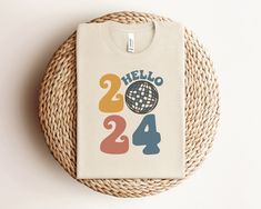 Hello 2024 Shirt, Happy New Year 2024 Shirt, Disco Ball Shirt, Retro New Years Shirt, Holiday Tshirts, 2024 Womens Shirt, New Years Gift, New Years Party Shirt, Winter Clothing, Hello 2024 Shirt, Trendy Shirt, Handmade Clothing, 2024 Crewneck, New Years Eve Tshirt, NYE 2024 Shirt, Cheers To The New Year, Goodbye 2023, New Years Day Shirt 🥳This Hello 2024 Shirt is a perfect gift for everyone! Our shirts are made with the highest quality materials & are super soft, comfy & cozy! 🥳 🟢 HOW TO ORDER 🟢 1. Check and Review ALL Photos 📷 2. Select Your T-Shirt Size and T-Shirt Color from drop down menus ✨ 3.Select Your Design Print Color from images and mention in personalization section 🎨 4. Add to cart & place order 🛒 We're constantly striving to provide excellent service. We'd love to get Retro New Years, Nye 2024, Hello 2024, Balls Shirt, New Years Shirts, Happy New Year 2024, Handmade Clothing, Womens Shirt, Trendy Shirts