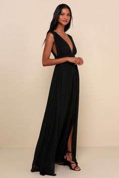 You'll be goddess-like for the entire evening in the Lulus Heavenly Hues Black Maxi Dress! Airy woven chiffon drapes alongside a V-neck and back, and lays across a banded waist. Full maxi skirt has a sexy side slit. Hidden back zipper with clasp. Fit: This garment fits true to size. Length: Floor length. Size medium measures 61" from shoulder to hem. Bust: Great for any cup size. Waist: Fitted - very fitted at natural waist. Hip: Not Fitted - room for hips. Undergarments: May be worn with petals Black Tie Wedding Guest Dress, Black Tie Wedding Guests, Full Maxi Skirt, Black Bridesmaids, Lulus Dresses, Cutout Maxi Dress, Tech Pack, Formal Dresses Gowns, Black Bridesmaid Dresses