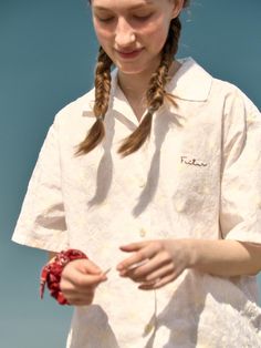 This product, the Sea Embroidery Shirt, captures a relaxed, beach-inspired aesthetic perfect for casual wear. The shirt features subtle embroidery that adds a touch of personality to the overall design. It is tailored for comfort with a loose fit, making it ideal for warm weather or a laid-back day by the sea. - This Sea Embroidery Shirt is adorned with delicate sea-themed embroidery on the front, adding a unique detail.- The short sleeves and lightweight fabric ensure comfort and breathability during hot weather.- Its loose, relaxed fit makes it perfect for casual outings and beach trips, offering both style and ease.- The shirt also features a classic button-up front and a soft collar, enhancing its versatile and timeless appeal. Summer Floral Embroidery Relaxed Fit Shirt, Summer Floral Embroidered Relaxed Fit Shirt, Beach Cotton Shirt With Floral Embroidery, Cotton Beach Shirt With Floral Embroidery, Summer Embroidered Relaxed Fit Shirt, Floral Embroidered Cotton Beach Shirt, Cotton Floral Embroidery Beach Shirt, Relaxed Fit Floral Embroidery Shirt For Vacation, Floral Embroidered Cotton Shirt For Beach