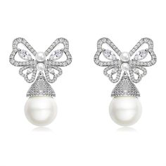 PRICES MAY VARY. Size: butterfly length：1.38inch(3.5cm) Weight:6g Bow:1.96inch(5cm)Weight:7g the lightweight design of these earrings ensures a comfortable fit for everyday wear. Material: 925 sterling silver posts, 14K gold plated copper, crystal, pearl, cubic zirconia, rhinestone. nickel-free, lead-free, cadmium-free and hypoallergenic, they don't cause any allergic reaction, comfortable for sensitive skins. Highly resistant to rust and tarnish are perfect for every day and night wear. Design Butterfly Cubic Zirconia Earrings For Formal Events, Butterfly Cubic Zirconia Earrings For Formal Occasions, Butterfly-shaped Cubic Zirconia Earrings For Formal Occasions, Formal Butterfly Cubic Zirconia Earrings, Formal Butterfly-shaped Cubic Zirconia Earrings, Elegant White Earrings With Butterfly Charm, Elegant White Butterfly Charm Earrings, Elegant Butterfly Cubic Zirconia Earrings, Wedding Drop Earrings With Butterfly Charm