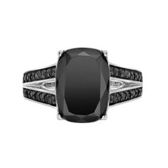 a black diamond ring set with two rows of black diamonds on the band and an oval cut