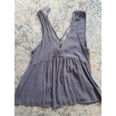 Size Xs, Flowy Periwinkle Linen Tank. It Has Ties That Go Up Through The Collar And Tie Into A Bow In The Back So It Can Be Adjusted Tighter. Wore 1x, Just Don't Reach For It. Lavender V-neck Top For Vacation, Gray Sleeveless Top For Vacation, Gray Casual Tank Top For The Beach, Casual Gray Tank Top For Beach, Trendy Lavender Tops For Beach, Purple Sleeveless Top For Day Out, Sleeveless Purple Top For Day Out, Casual Purple Tank Top For Vacation, Casual Purple Tank Top For Day Out