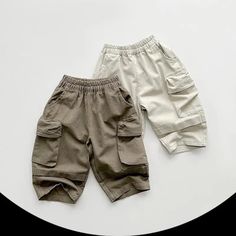 Upgrade your little one's wardrobe with our Boys Solid Pocket Cargo Pants. Crafted from high-quality cotton, these pants offer a comfortable fit that's perfect for everyday wear. The mid-rise waist and elastic waistband ensure a secure and adjustable fit. With their classic cargo design and functional pockets, these pants are both stylish and practical. Whether they're playing at the park or exploring the outdoors, these harem-style pants are a must-have for boys aged 1-6 years. Dress them up or Adjustable Waist Cotton Pants With Pockets, Cotton Bottoms With Side Pockets And Adjustable Waist, Cotton Khaki Cargo Pants With Elastic Waistband, Non-stretch Khaki Cotton Pants, Non-stretch Solid Cotton Cargo Pants, Pants With Pockets And Adjustable Waist, Adjustable Waist Cotton Bottoms, Cotton Bottoms With Adjustable Waist, Non-stretch Cotton Cargo Pants