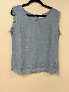 Elevate your wardrobe with our Italian Linen Distressed Hem Tank Top! Made with premium linen, it offers a comfortable and loose fit, perfect for any body size (s-l). The buttoned back, scoop neckline and distressed hem add a touch of style to this basic, versatile piece. Easy to wear, easy to love! Winter Tops, Easy To Love, Fall Shopping, Hat Shop, Body Size, Scoop Neckline, Summer Collection, Apparel Accessories, Scarf Accessory