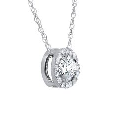 This popular women's fancy solitaire pendant features 1/3ct center and 12 round brilliant cut accent stones.  All diamonds are set in solid 10k white gold.  An 18" 10k white gold clasp lock chain is included. Round Solitaire Halo, Gold G, White Gold Chains, Halo Pendant, Circle Diamond, Heart Pendant Diamond, Solitaire Pendant, Diamond Halo, Diamond Solitaire