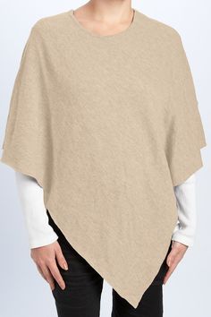 Material: 100% Merino Wool Description: Easy to throw on over any top or dress. This asymmetrical piece is a must-have for your modern wardrobe. Ella poncho is lightweight and easy to carry on purse or bag as well. Merino wool is comfortable, soft and warm material. ONE SIZE Color: Beige. Piironki Helsinki is Finnish lifestyle company established 1978. Their focus is relaxed, beautiful and cozy living. Oversized Solid Color Casual Poncho, Beige Poncho For Layering, Chic Poncho For Layering, One Size Beige Poncho For Layering, Beige Batwing Sleeve Poncho For Fall, Chic One-size Poncho For Layering, Oversized Solid Poncho For Layering, Versatile Fall Poncho, Chic Spring Poncho With Batwing Sleeves