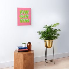 a potted plant sitting on top of a wooden table