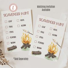 two scavenger hunt cards sitting on top of a table next to dried plants