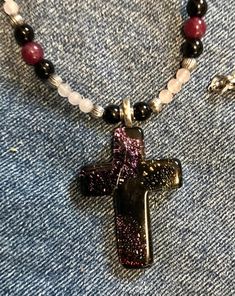 Beautiful dichroic art glass cross complimented with rose quartz, ruby zoisite, and onyx beads making a gorgeous necklace.  In the picture it looks like there is a scratch in the cross - it is the light hitting a fold in the glass from the making- no scratch.  Simple, elegant - and with the stones of love and emotional healing along with the healing and life force - great combination, it looks lovely.   The cross is a beautiful fusion of glass and precious metals with varying colours.  Colours v Spiritual Crucifix Cross Necklace For Jewelry Making, Beaded Spiritual Cross Pendant Necklace, Beaded Cross Pendant Necklace As A Gift, Handmade Healing Cross Jewelry, Glass Cross, Beads Making, Rose Quartz Necklace, Ruby Zoisite, Life Force