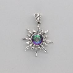 This is a beautiful MYSTIC TOPAZ Pendant in 925 Sterling Silver. The metal is solid silver without any nickel or other substances causing most allergies making the jewelry hypo allergenic. Size of the Pendant (in total incl. Bail)   3.7 x 2.7 cm or 1.46 x 1.06 inch Please note: Our jewelry is photographed close up to show detail and may appear larger than they are. We are happy to help with any questions. We use a dime coin as size reference on one of the pictures. You will receive the item in a Celestial Star-shaped Silver Jewelry, Iridescent Sterling Silver Round Jewelry, Sterling Silver Star-shaped Jewelry, Iridescent Round Sterling Silver Jewelry, Hypoallergenic Sterling Silver Iridescent Jewelry, Hypoallergenic Iridescent Sterling Silver Jewelry, Iridescent Sterling Silver Spiritual Jewelry, Silver Celestial Pendant Jewelry, Sterling Silver Star Jewelry In Silver