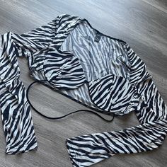 Zebra Long Sleeve Crop Top From Shein. Arms Are Sheer Material, Chest Is Not Sheer. Size Large Never Worn Fitted Black Top With Zebra Print, Fitted Black Zebra Print Top, White Long Sleeve Top With Zebra Print, White Zebra Print Tops For Summer, Spring Stretch Zebra Print Top, Spring Zebra Print Stretch Top, Spring Zebra Print Tops For Beach, Spring Beach Zebra Print Tops, Sheer Material