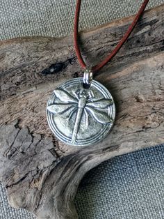 "You can find more silver treasures in my shop! Click here: https://www.etsy.com/shop/SeasideSilverJewels Or follow me on Facebook: https://www.facebook.com/SeasideSilverJewels/ The dragonfly is a magic part of our fun summer days. I can only try to capture the beauty of this amazing insect. SIZE AND DETAIL: It's about 1' long and 1\" wide. Each pendant contains approximately 5.0 grams of fine silver. I handcraft each piece so weight may vary slightly. All my materials are recycled and/or natura Silver Bohemian Necklace, Silver Bohemian Necklace For Everyday, Handmade Bohemian Dragonfly Necklace, Bohemian Handmade Dragonfly Necklace, Silver Bohemian Jewelry For Everyday, Bohemian Silver Dragonfly Necklace, Casual Bohemian Silver Jewelry, Insect Necklace, Art Clay Silver