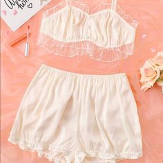 Mesh Trimmed Night Set With Ruffle Hem In Cream Colored Satin. The Bra Top Has Adorable Button Details, And The Shorts Are High Waisted And Super Flattering. Brand New ! Never Worn ! Size M Bust: 30.7-52 “ Waist: 26.8-47.2 “ Hip: 48 Bra Top Length: 12.2 “ Shorts Length: 12.3 “ White Sheer Sleepwear For Sleepovers, White Lace Trim Pajama Shorts For Sleep, Lingerie Gown, Green Lingerie, Night Set, Floral Lingerie, Holloween Costume, Pink Corset, Womens Wedding Dresses