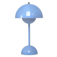 a light blue table lamp on a white background