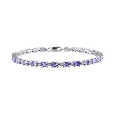 "Alternating tazanite and white topaz gemstones give this sterling silver bracelet eye-catching beauty. Comes in a gift box. BRACELET DETAILS Length: 7 in. Clasp: lobster-claw Metal: sterling silver STONE DETAILS Stone type: genuine tanzanite, genuine white topaz Shape: oval, round Setting: prong  Size: 7"". Color: Purple. Gender: female. Age Group: adult." Tanzanite Bracelet, Topaz Bracelet, Tanzanite Jewelry, Topaz Gemstone, Sterling Silver Bracelet, Tennis Bracelet, White Topaz, Sterling Silver Bracelets, Womens Jewelry Bracelets