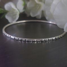 Elevate your style, your outfits, and your jewelry collection with this handmade solid S925 sterling silver diamond cut bangle bracelet. This stunning piece features intricate detailing that will make showcases craftsmanship, adds beauty to any outfit, and makes it a perfect gift. Please check out the chart in the photos to know your size. ◾D E T A I L S◾ ▪M A T E R I A L: This bangle bracelet is all handmade with care with the highest and bestest quality silver ▪D E S I G N: The design on this bangle bracelet it intricate, unique, and absolutely stunning and it is accomplished by diamond cuts.  ▪WHY YOU'LL LOVE IT: This unique sterling silver bangle bracelet is more than just a piece of jewelry; it's a statement of style and charm. The diamond cut design it stunning and gorgeous. Its beau Diamond Cut Sterling Silver Bracelet Gift, Sterling Silver Diamond Cut Bracelet Gift, Fine Jewelry Silver Bangle With Diamond Cut, Fine Jewelry Silver Diamond Cut Bangle, Gift Sterling Silver Diamond Cut Bracelet, Sterling Silver Diamond Cut Bracelets, Silver Diamond Cut Bangle Fine Jewelry, Sterling Silver Diamond Cut Bracelet, Gift Sterling Silver Bracelet With Diamond Cut