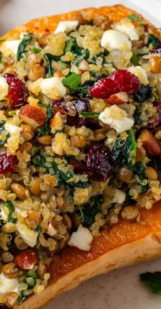 a close up of food on a plate with greens and other things to eat in the background