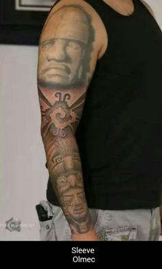 a man with a tattoo on his arm