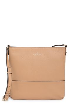 Go hands-free with this pebbled leather crossbody bag featuring a roomy interior for your daily essentials. 10.1" H x 10.1" W x 1.2" D 22" strap drop Top zip closure Exterior with foil embossed logo Interior with spade jacquard lining; wall slip pockets; wall zip pocket Leather exterior/textile lining Imported Beige Pebbled Leather Crossbody Shoulder Bag, Classic Pebbled Crossbody Shoulder Bag, Classic Crossbody Shoulder Bag With Pebbled Texture, Everyday Use Crossbody Bag With Pebbled Texture, Pebbled Texture Crossbody Bag For Everyday Use, Everyday Pebbled Texture Crossbody Bag, Everyday Pebbled Texture Crossbody Shoulder Bag, Pebbled Leather Crossbody Bag, Drop Top