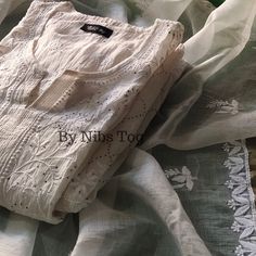 Nibs Tog Roohani Ivory Chikankari Kuta with Dupatta Set Pure Mulmul Chanderi (Semi Stitched), Indian Ethnic Party Wear Chikankari Suit Dyeble Shop More Chikankari outfits by Nibs Tog on our Shop : https://www.etsy.com/in-en/shop/NibsTog PLEASE NOTE: Since its hand embroidery, every design has single piece only, therefore, you may get a different design motif Suit. This also ensures the uniqueness of the outfit you will receive. Please connect us to check the designs available. Package Includes: Kurta+Dupatta Features: Fabric: The Ivory Chikankari Suit is made of Pure mulmul Chanderi Cotton fabric. Super soft & versatile. Style: The Chikankari Suit is made in Slight A Line pattern. The Suit is Semi Stitched and has Chikankari hand embroidery, embellished with mukaish. Colour: The Chikankari Traditional Fitted Beige Anarkali Set, Cream Chikankari Embroidery Traditional Wear For Eid, Designer Beige Chikankari Embroidery Sets, Festive Off White Set With Chikankari Embroidery, Beige Traditional Anarkali Set With Straight Kurta, White Anarkali Set With Resham Embroidery For Transitional Season, Fitted Off White Sets With Chikankari Embroidery, White Semi-stitched Anarkali Set For Transitional Season, Festive Off-white Set With Chikankari Embroidery