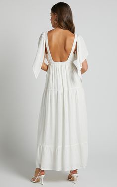 Lyrad Empire Maxi Dress - Waist Textured Dress in White | Showpo USA Flowy A-line Sundress For Brunch, Vacation A-line Midi Dress With Tie Back, Elegant Spring Sundress For Brunch, Flowy A-line Dress For Brunch, Flowy A-line Brunch Dress, Elegant A-line Maxi Dress For Vacation, Elegant Summer Maxi Dress For Brunch, Elegant Dress With Smocked Back For Day Out, Tiered Maxi Dress With Tie Back For Brunch