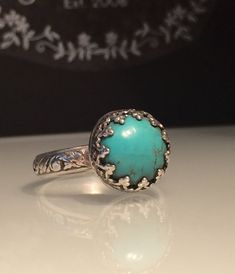 Turquoise ring. Natural Turquoise and a Solid Silver Ring. Artisan turquoise and Sterling silver crown ring. Renaissance Ring. Gift for her. This stunning solid silver and kingman turquoise ring is a size 7 but is available in any size with a very similar stone stone in 3 days. The beautiful natural turquoise stone measures just under 1/4 of an inch or 12mm. This unique yet very versatile ring is sure to be your new go to accessory or makes the perfect gift. ❤️❤️Comes in a Jewelriart Gift box. G Artisan Handmade Turquoise Wedding Ring, Artisan Handmade Turquoise Ring For Wedding, Bohemian Turquoise Ring With Natural Stones, Vintage Turquoise Promise Ring, Turquoise Vintage Promise Ring, Bohemian Sterling Silver Turquoise Wedding Ring, Spiritual Turquoise Ring For Healing, Unique Turquoise Gemstone Ring For Wedding, Adjustable Turquoise Bohemian Ring