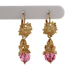 This is an exquisite pair of ornate 18K Italian Yellow Gold, Floral Drop Dangle Earrings. The Earrings feature an intricately crafted Floral Gold Design, with a beautiful Round Shaped, Faceted Pink Glass Bead Accent, measuring 7.60 mm in Diameter.  The Earrings measure 1.5" in Length x 10.85 mm in Width &10.85 mm Thick. These Vintage Drop Dangle Earrings are secured with Lever Backs, for a secure, worry-free wear. This stunning pair of Fine Vintage Earrings are being offered here for an unbeatab Drop Dangle Earrings, Pink Glass, Fine Jewellery Earrings, Gold Design, Diamond Gemstone, Gold Material, Vintage Earrings, Vintage Floral, Jewelry Stores