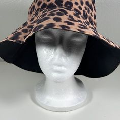 Reversible Leopard Print Bucket Hat. Black Interior. Osfm. This Hat Is Awesome. It Is Reversible. The Two Colors Are Leopard Print And Black. This Hat Is Brand New In The Package. Packable Wide Brim Bucket Hat, Black Brimmed Bucket Hat One Size, Reversible Black Bucket Hat, One Size Flat Brim Bucket Hat With Uv Protection, Adjustable Black Bucket Hat With Upf 50+, Black Bucket Hat With Upf 50+ And Curved Brim, Black Reversible Bucket Hat, Black Reversible Bucket Hat With Curved Brim, Black Lightweight Bucket Hat With Curved Brim