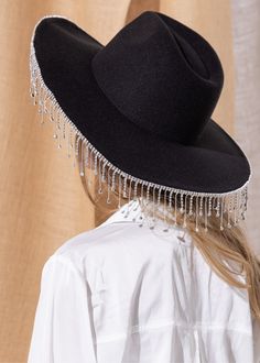 Cowboy style hat Rhinestone fringe along the brim Felt fabric One size fits most *Colors may vary slightly due to monitor resolution and lighting* Adjustable Flat Brim Hat With Fringe, Western Style Adjustable Hat With Rhinestone Fringe, Festival Fedora Hats With Rhinestones, Wide Brim Fringe Hat For Festivals, Western Party Hat With Rhinestone Fringe, Festival Hats With Rhinestones And Short Brim, Festival Hats With Rhinestones And High Crown, Festival Hat With Rhinestones And High Crown, Adjustable Brimmed Hat With Rhinestones