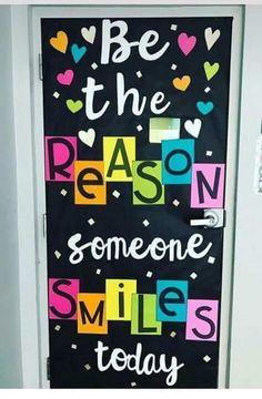 a door decorated with the words be the reason someone smiles today