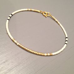 Dainty gold bracelet Elegant Slim Bracelet Dainty bracelet Black Gold Bracelet, Dainty Gold Bracelet, Bracelet Elegant, Bracelet Dainty, Dainty Bracelet, Jewelry Black, Delica Beads, Dainty Bracelets, Bracelet Gold