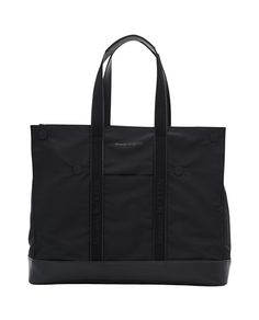 This spacious tote bag from Alexander McQueen is crafted for modern convenience. A secure zip closure ensures your belongings are safe, while double leather handles and a detachable leather strap provide versatile carrying options, blending style with practicality.

- Secure zip closure  
- Double leather handles  
- Detachable leather strap  
- Spacious design Black Tote Briefcase With Detachable Handle, Black Top Handle Briefcase With Detachable Handle, Black Briefcase Tote With Detachable Handle, Black Briefcase With Detachable Handle, Designer Black Briefcase With Detachable Handle, Black Business Satchel With Handles, Designer Black Briefcase With Double Handle, Functional Black Shoulder Bag With Handles, Business Bag With Removable Pouch And Round Handle