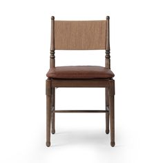 a wooden chair with a brown leather seat