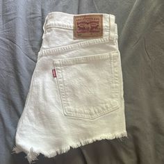 Brand New White Levi Denim Shorts, Size 26 Trendy White Straight Leg Jean Shorts, White Short Denim Jeans, White Straight Leg Shorts With Pockets, Levi's Summer Jeans With Five Pockets, White Casual Cutoff Jean Shorts, Casual White Cutoff Jean Shorts, Levi's Summer Jeans, White Relaxed Fit Straight Leg Jean Shorts, Summer Cotton Cutoff Jeans