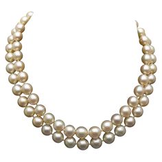 A classic and elegant double strand Akoya pearl neckace. The cultured Akoya pearls of cream color with rose overtones, and a gorgeous high luster. One strand consists of 37 pearls, the other 35. The pearls of nice size and shape, measuring 7.8 to 9.28 mm, round to near round. Necklace length is 15 inches with a 14K gold clasp embellished with a cabochon emerald, two cabochon rubies and four cabochon sapphires. Marked 14K on clasp. Total weight of necklace is 70.5 grams. An appraisal document by Luxury Classic Double Strand Necklace, Luxury Double Strand Jewelry With Faceted Beads, Luxury Double Strand Beaded Pearl Necklace, Luxury Beaded Double Strand Pearl Necklace, Akoya Pearl Necklace, Necklaces Beaded, Miriam Haskell Jewelry, Vintage Beads Necklace, Body Jewelry Piercing