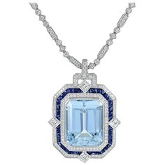 Platinum Set Pendant by Sophia D with 24.38 carats Aquamarine Center accented by Sapphires weighing 3.77 carats and Diamonds with a 3.68 carat total weight. Sophia D by Joseph Dardashti LTD has been known worldwide for 35 years and are inspired by classic Art Deco design that merges with modern manufacturing techniques. Vampire Jewelry, Platinum Pendant, Jewelry Rendering, Expensive Jewelry Luxury, Historical Jewellery, Aquamarine Pendant, Art Deco Pendant, Diamond Jewelry Designs, Aquamarine Jewelry