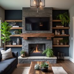 a living room filled with furniture and a flat screen tv mounted on the wall above a fire place