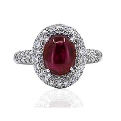 Add a touch of elegance with the Ruby Cabochon Ring. Featuring a beautiful cabochon ruby, this ring brings a luxurious feel to any outfit. 14k White Gold Ring 3.24 carat cabochon ruby Approx 1.00 carats of round brilliants Ruby Cabochon Ring, Cabochon Ruby, Cabochon Ring, Sarasota Fl, 14k White Gold Ring, White Gold Ring, Sarasota, Round Brilliant, Gold Ring