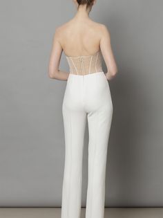 Perfect for any bridal occasion, these high rise, fitted and flared bootleg "Marie" trousers in ivory crepe are a classic pant staple, lined in silk satin and fastened with an invisible zip at the back. Glamorous Fitted Pants For Gala, Elegant Evening High-waisted Pantsuit, Evening Pantsuit With Structured Boning, Elegant Flared Bottoms For Wedding, Elegant Fitted Pants For Gala, Elegant Evening Pantsuit With Trousers, Elegant Party Pantsuit With Trousers, Elegant Fitted Evening Pants, Elegant Fitted Flare Pants