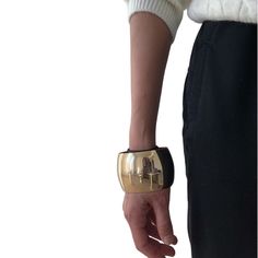 Take Your Stack To The Next Level With This Beautiful, Gold Plated Statement Bracelet. Its Simple Yet Eye-Catching Design Is A Perfect For Day And Night. Metallic Gold Bangle Width 2.5" Circumference 2.73" Timeless Piece Is Perfect Worn Solo Or Stacked Alongside Your Favorite Bracelet Bangle Stack Comes In With A Dust Bag. Material - Iron Gold Plated Modern Gold Leather Bangle Bracelet, Trendy Gold Leather Bracelet, Gold Leather Cuff Bracelet, Modern Gold Wristband Bracelet, Elegant Metal Wristband Bracelet, Elegant Leather Cuff Bracelet For Party, Elegant Leather Bangle Bracelet For Party, Modern Leather Bracelet For Party, Modern Leather Bracelet For Parties