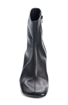 An embossed logo is stamped at the cuff of a minimalist square-toe bootie lifted by a softly flared block heel that embodies the label's streamlined sophistication. 2" heel,50mm (size 39) 6" shaft (size 39) Side zip closure Leather upper, lining and sole Made in Italy Designer Shoes Luxury Square Toe Boots With Stacked Heel, Modern Heeled Boots With Padded Ankle For Work, Modern Ankle-high Formal Boots, Modern Ankle-high Heeled Boots For Formal Occasions, Modern Ankle-high Boots For Formal Occasions, Modern Formal Ankle-high Boots, Classic Ankle-high Heeled Boots For Evening, Modern High Ankle Heeled Boots With Padded Ankle, Modern Mid-calf Boots With Reinforced Heel