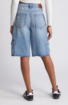 Channel laid-back skater style with these baggy nonstretch-denim shorts featuring raw hems and a plethora of cargo pockets for a lived-in look. 12" inseam; 12" front rise Zip fly with button closure Five-pocket style; cargo flap-patch pockets 100% cotton Machine wash, tumble dry Imported Spring Denim Cargo Shorts, Casual Denim Cargo Shorts With Multiple Pockets, Denim Cargo Shorts With Multiple Pockets For Spring, Spring Denim Cargo Shorts With Multiple Pockets, Denim Cargo Shorts For Spring, Denim Utility Cargo Shorts With Side Pockets, Denim Cargo Shorts With Side Pockets, Summer Denim Cargo Shorts With Hip Pockets, Utility Style Short Length Streetwear Bottoms