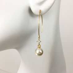 "Pearl Earrings, Gold Pearl Earrings, Simple Pearl Earrings, CZ Earrings, Pearl Dangle Earrings, Long Dangle Earrings, Minimal Earrings, Round Pearl Earrings, Wedding Bridal Earrings, Bridesmaid Gift, Pearl Jewelry, Gift for Her Minimal classic design, these lovely earrings are composed of a small gold/silver/rose plated prong set diamond shaped CZ with a 10mm creamy white round faux pearl dangling from long oval gold/silver/rose tone copper ear wires. Short dangle is 1.25\" from top of ear wire Classic Single Teardrop Earring For Wedding, Elegant Pearl Drop Crystal Earrings As Gift, Elegant Teardrop Earrings With French Hook, Classic Teardrop Earrings For Wedding, Dainty Ear Wire Bridal Earrings For Anniversary, Classic Single Earring For Wedding, Dainty Bridal Earrings With Ear Wire For Anniversary, Classic Wedding Teardrop Earrings, Elegant Teardrop Pearl Earrings With French Hook