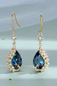 Vintage style peacock pearl teardrop earrings. Dressy, fancy, perfect for wedding, party. Sapphire Dark Blue color 1 3/4", thickness 8 mm Long Crystal Earrings, Pearl Teardrop Earrings, Peacock Feather Earrings, Peacock Pearl, Dark Blue Color, Vintage Elegant, Feather Earrings, Rhinestone Necklace, Sterling Silver Studs