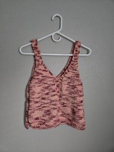 The perfect summer top, knit with cotton and a burst of pink to brighten your day. Handknit.  Slightly cropped and S fits 33 bust, M fits 37 bust, L fits 41 bust, XL fits 45 bust.  Feel free to reach out for different bust sizes or lengths-- since I knit everything, it is fully customizable. :) Streamline Tank pattern from Two of Wands Pink V-neck Crochet Top For Spring, Summer V-neck Knitted Top, Casual Pink Chunky Knit Top, Spring Knitted V-neck Crop Top, Stretch Soft Knit Top, Stretch Cotton Knit Top For Loungewear, Spring Cozy Knit Top, Cozy Knit Top For Spring, Casual Knit Knitting Pattern