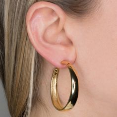 Product Description: Lightweight, gold-plated hoop earrings are a jewelry box staple! As seen on Adwoa Aboah and Chrissy Teigan.  Dimensions: 1.75" x 1.75" ﻿Style Number: ﻿4390EPG Adwoa Aboah, Kenneth Jay Lane, Clip Earrings, Gold Hoops, Gold Hoop Earrings, Clip On Earrings, Ear Cuff, Gold Earrings, Jay