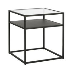 a black metal and glass side table with one shelf on the bottom, two shelves below