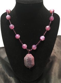 "So very pretty, this amethyst agate necklace with amethyst faceted bicone Swarovski crystals and purple faceted agate focal piece.  Finished off with a round sterling box clasp, set with a amethyst. Agate beads, 11mm; bicone crystals, 3mm and 5mm; clasp, 10mm; focal, 40mm, 20\" long" Purple Gemstone Bead Pendant Jewelry, Purple Pendant Jewelry With Gemstone Beads, Unique Amethyst Gemstone Bead Jewelry, Unique Amethyst Gemstone Beads Necklace, Unique Amethyst Gemstone Beaded Jewelry, Elegant Agate Crystal Necklaces For Healing, Elegant Agate Crystal Necklace For Healing, Elegant Amethyst Necklace For Healing, Adjustable Faceted Agate Jewelry